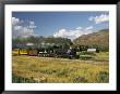 Old Locomotive With Billowing Black Smoke In Hilly Countryside by Richard Nowitz Limited Edition Print