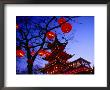 Chinese Pagoda And Tree Lanterns In Tivoli Park, Copenhagen, Denmark by Izzet Keribar Limited Edition Print