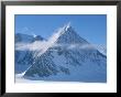 A Cloud Passes By Windblown Pyramid Peak, In Antarctica by Gordon Wiltsie Limited Edition Print