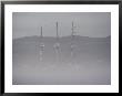 Fog Shrouds A Boat In The Early Morning by Bill Curtsinger Limited Edition Print