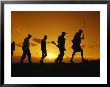 Silhouette Of Laikipia Masai Guides And Tourists On A Bush Safari by Richard Nowitz Limited Edition Print
