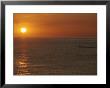 A Boat Passes In Front Of The Setting Sun In Baja, Mexico by Jimmy Chin Limited Edition Pricing Art Print