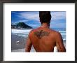 Tattooed Surfer Looking At Beach, San Sebastian, Spain by Dallas Stribley Limited Edition Print