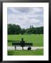 Man Sits In The English Garden In Munich by Taylor S. Kennedy Limited Edition Pricing Art Print