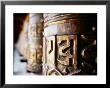 Detail Of Prayer Wheels With Tibetan Pali Script, Kagbeni, Nepal by Anthony Plummer Limited Edition Pricing Art Print