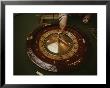 A Patron Spins A Roulette Wheel At A Casino In Monaco by Jodi Cobb Limited Edition Print