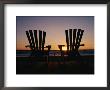 Two Chairs On A Shoreline Facing The Setting Sun by Steve Winter Limited Edition Pricing Art Print