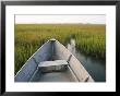 The Bow Of A Rowboat Slices Through The Marsh Grass by Skip Brown Limited Edition Print