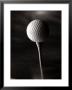Golfball On Tee by Fogstock Llc Limited Edition Print