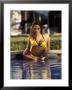 Woman In Yellow Bikini Sitting In Pool by Stewart Cohen Limited Edition Pricing Art Print