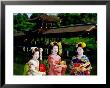 Women Dressed As Geisha With Building In Background, Heian-Jingu, Kyoto, Japan by Frank Carter Limited Edition Print