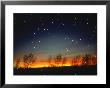 Silhouetted Landscape Below Star-Filled Sky by Chris Rogers Limited Edition Print