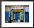 Person Wandering Past Buildings, Gafsa, Gafsa, Tunisia by Martin Lladó Limited Edition Pricing Art Print