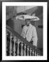 Waiter At Homestead Hotel Carrying Tray On His Head by John Phillips Limited Edition Print