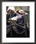 Gondolier Relaxing In Gondola, Venice, Veneto, Italy by Adam Woolfitt Limited Edition Print