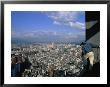 A Construction Worker On A Skyscraper Views Taipeis Cityscape by Jodi Cobb Limited Edition Pricing Art Print