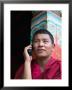 Monk Using Cell Phone In Qiangbalin Temple, Chamdo, Tibet, China by Keren Su Limited Edition Print