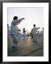 Early Morning T'ai Chi Exercises In Huangpu Park On The Bund, Shanghai, China by Gavin Hellier Limited Edition Print