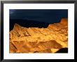 Dawn Light Over Zabriskie Point Yellow-Tinted Rock Formation, Death Valley National Park, U.S.A. by Ruth Eastham Limited Edition Print