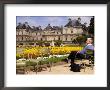 People Relaxing In Chairs In Jardin Du Luxembourg, Paris, France by Glenn Beanland Limited Edition Print