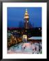 Outdoor Night Ice Skating In Front Of Ferry Building, San Francisco, California, Usa by Curtis Martin Limited Edition Print