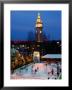 Outdoor Night Ice Skating In Front Of Ferry Building, San Francisco, California, Usa by Curtis Martin Limited Edition Print