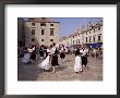 Tourist Board Folk Dancers In Lusa Square, Dubrovnik, Dalmatia, Croatia by Peter Higgins Limited Edition Print