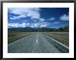 Straight Road Heading Towards Mountains And Clouds by Todd Gipstein Limited Edition Print