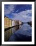 Historic Warehouses In Morning, Trondheim, Norway by Walter Bibikow Limited Edition Print