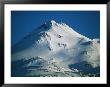 A Snow-Covered Mountain Reaches Toward The Sky by Joel Sartore Limited Edition Print