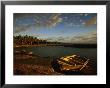 Boat On Shore In Morning Light, Vaipae, Aitutaki by Walter Bibikow Limited Edition Print