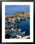 Fishing Boats Moored In Harbour And 16Th Century Fortress In Background, Iraklio, Greece by John Elk Iii Limited Edition Print