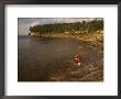 Backpackers At The Mouth Of The Mosquito River, Pictured Rocks National Lakeshore, Michigan by Phil Schermeister Limited Edition Print