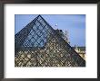 The Louvre As Seen Through The Glass Pyramid Of Its Entrance by Cotton Coulson Limited Edition Print