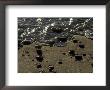 Close View Of Surf Rolling Over Rocks On A Sandy Beach, Block Island, Rhode Island by Todd Gipstein Limited Edition Print