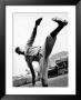 Satchel Paige, Pitcher For Ny Black Yankees Showing Off His High Kick Delivers Cannonball Pitch by George Strock Limited Edition Print
