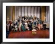 Mgm Head Louis B. Mayer Feting Metro Goldwyn Mayer's 60Th Birthday In A Portrait With Studio Stars by Walter Sanders Limited Edition Print