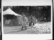 Indians Walking Near Tents On The Grounds Of Buffalo Bill's Wild West Show by Wallace G. Levison Limited Edition Print