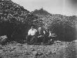 Three Well-Dressed Men Sitting In A Quarry During An Outing by Wallace G. Levison Limited Edition Pricing Art Print