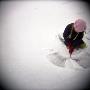 High Angle View Of A Girl Playing In Snow, Sweden by Inger Bladh Limited Edition Print