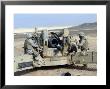 Us Marines Prepare To Fire A Howitzer Near Baghdad, Iraq, January 6, 2007 by Stocktrek Images Limited Edition Print