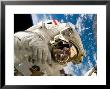 An Astronaut Mission Specialist Participates In The Mission's Extravehicular Activity by Stocktrek Images Limited Edition Print