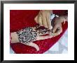 Henna Designs Being Applied To A Woman's Hand, Rajasthan State, India by Bruno Morandi Limited Edition Print