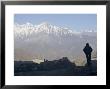 Trekker At Dawn Looking Out Over The Old Fortified Village Of Jharkot On The Annapurna Circuit Trek by Don Smith Limited Edition Pricing Art Print