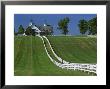 Double White Fence Flows From An Elegant Horse Barn, Woodford County, Kentucky, Usa by Dennis Flaherty Limited Edition Print