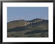 Rows Of Spinning Wind Turbines Generate Electricity by Marc Moritsch Limited Edition Print