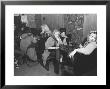 Girlfriends Of Hell's Angels Members Sitting Away From Hell's Angels In Separate Part Of The Bar by Bill Ray Limited Edition Print