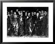Emaciated Male Prisoners Behind Barbed Wire Fence At Buchenwald Concentration Camp by Margaret Bourke-White Limited Edition Print