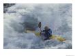 A Kayaker Paddles Through White-Water Rapids On The Snake River by Raymond Gehman Limited Edition Print