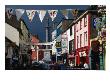 Street Decorated With Buntings And Signs, Ennis, Ireland by Wayne Walton Limited Edition Print